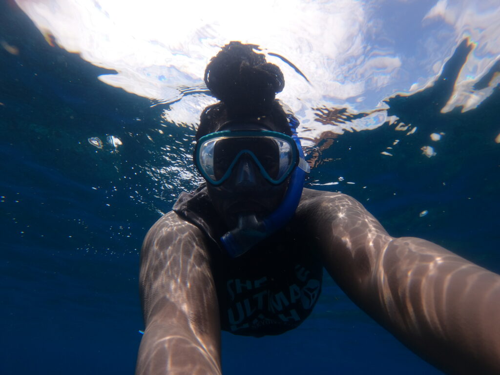 Black woman snorkeling